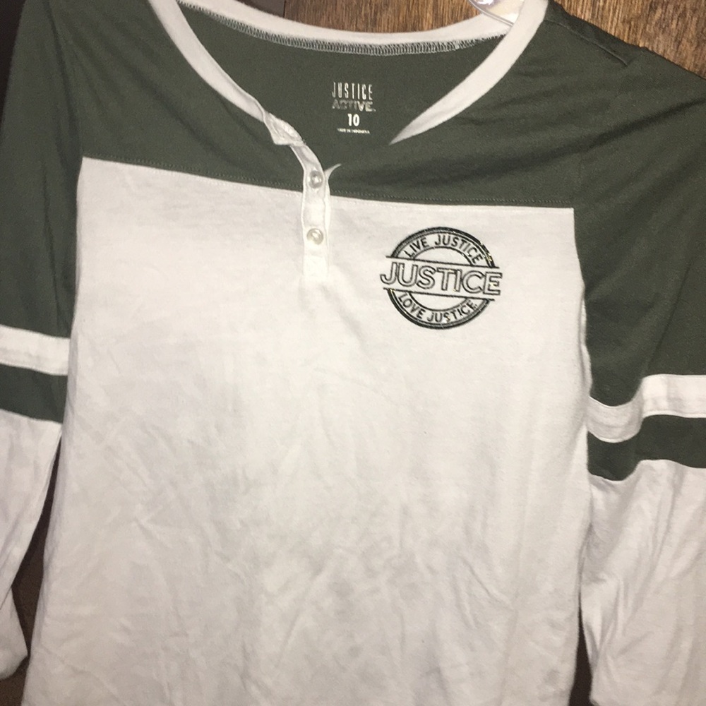A white and green long sleeve shirt